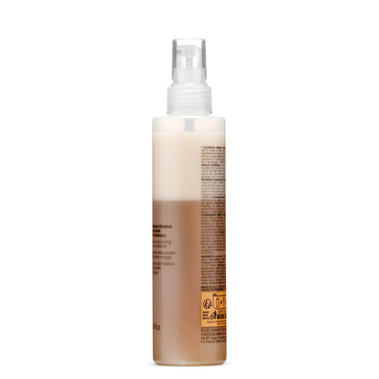 Leave-in conditioner spray for dry, curly hair with keratin and milk proteins, made in Italy