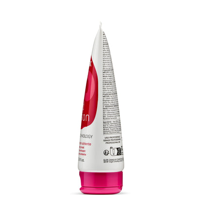 White and pink tube of nourishing hair mask with multilingual instructions, professional use
