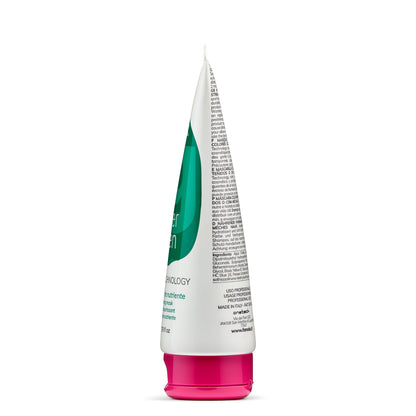 White tube with green label and pink cap, professional hair coloring mask for nourishing and hydrating hair