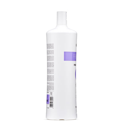 White bottle of Fiber hair treatment with purple label, made in Italy for colored and bleached hair care