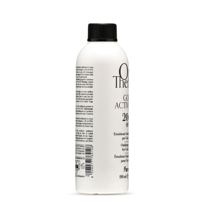 White bottle of 20 volume hair developer with black cap, professional hair color oxidizing emulsion