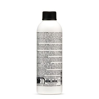 Color Keratin oxidizing emulsion in white bottle with black cap, professional hair color developer