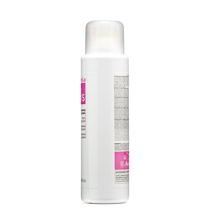 White bottle of Fanola perm solution for thick hair, professional use, with multilingual instructions and pink label details.